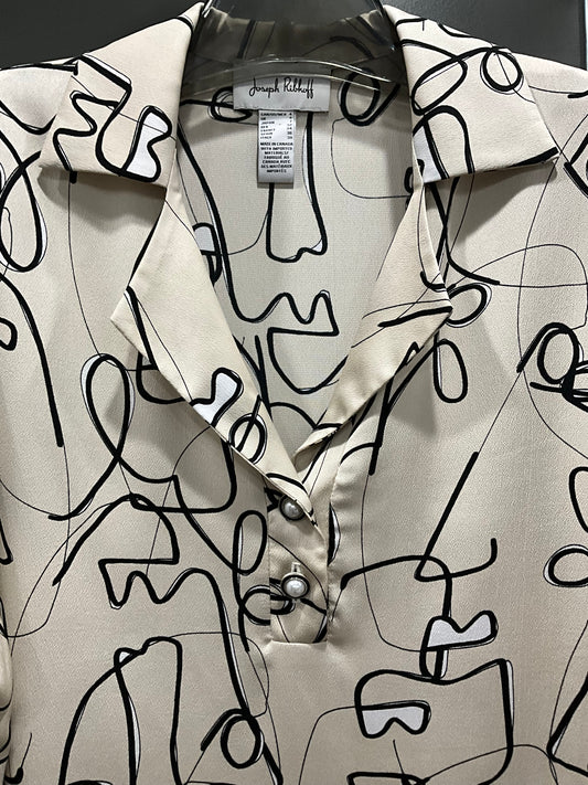 GEOMETRIC FACE BLOUSE