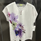 PURPLE FLORAL THREE BUTTON TEE