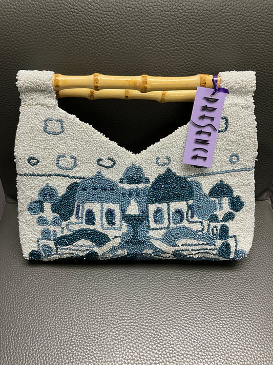 WELL TRAVELED BEADED BAG