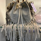 SUEDE AND LEATHER FRINGE HANDBAG