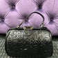 LEATHER FLORAL EMBOSSED HANDBAG