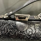 LEATHER FLORAL EMBOSSED HANDBAG