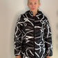 SCRIBBLE PUFFER COAT WITH CRYSTAL ZIPPER